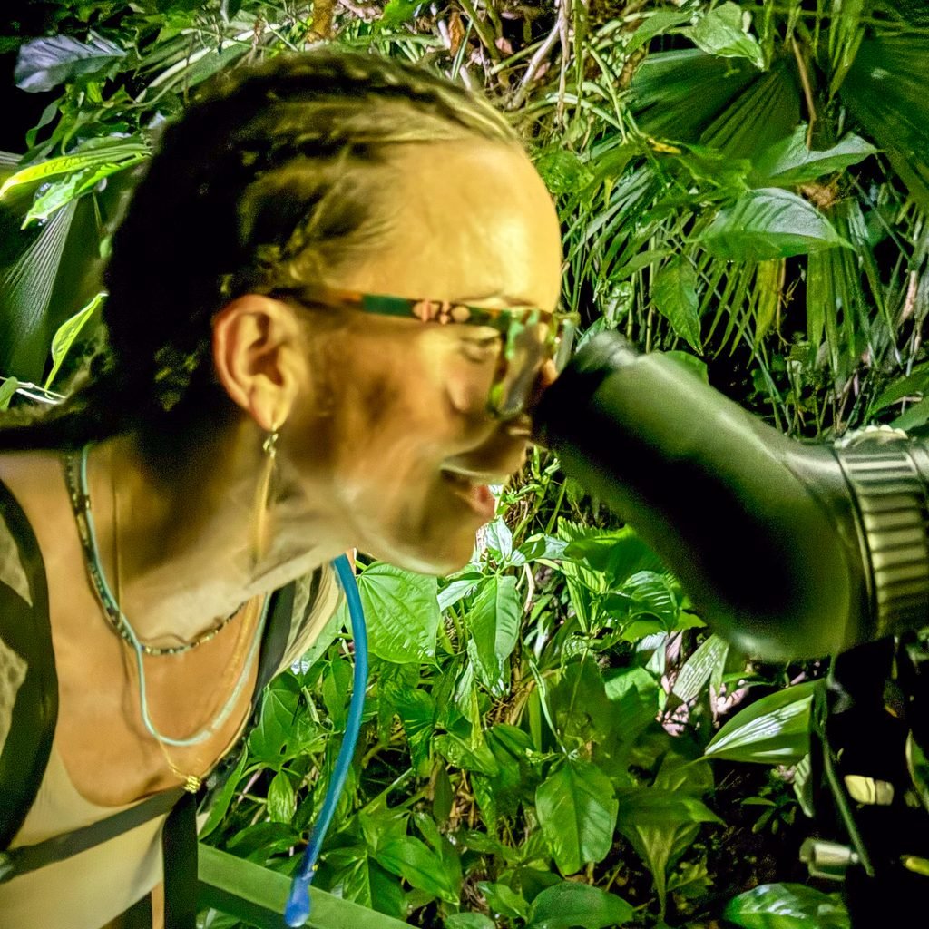 Guest looking through a spotting scope